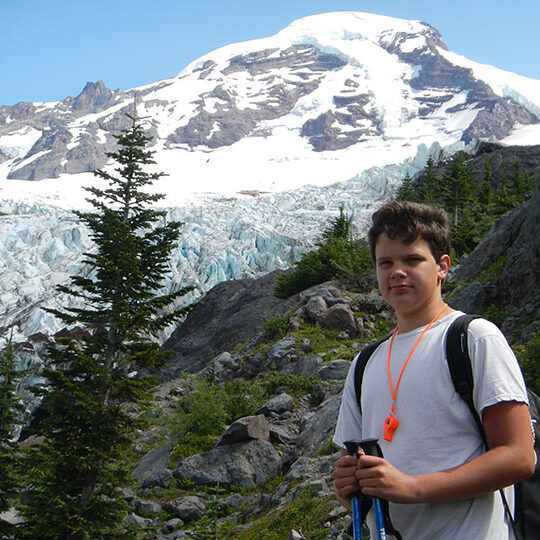Boy Snowy Mountain Web