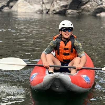 Boy Smiling In Kayak Web